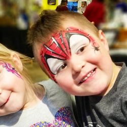 Beyond The Lines face art - Unicorn and Spiderman face painting