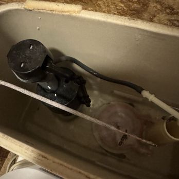 Paramedic Plumbing - It was "running."  Old toilet with an older Toto attachment - Jason fixed in about 30 minutes! - Plumbing Near Me - Anaheim, California