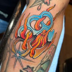 North Shore Tattoo Company - Chrome Nuckle Dusters by Adam Barron at North Shore Tattoo