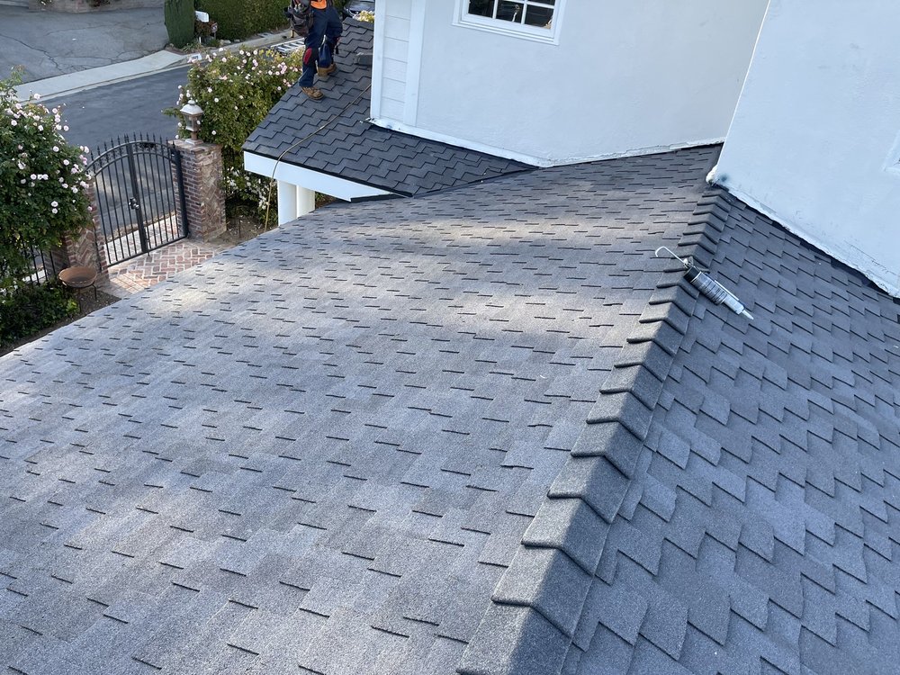 Slide of Goliath Roofing