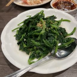 Pea shoot with minced garlic. Very good Pea shoot with minced garlic. Very good