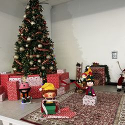 Mercantile On Main - Holiday decorations with vintage Sibleys Santa's workshop animatronics