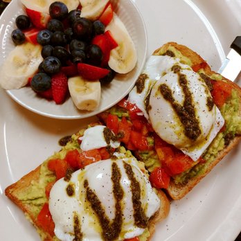 Cinnamon Pancake House - Capri Toast; avocado, grilled tomatoes, poached eggs, topped with pesto sauce. - Breakfast & Brunch Near Me - Naperville, Illinois