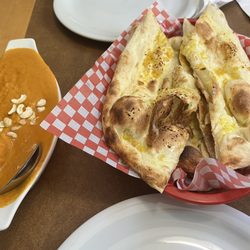 India Delight Bistro & Bar - Prawn Korma  garlic naan