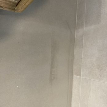 Creek Stone Resurfacing - Patch work by fireplace, two different colors - Flooring Near Me - San Diego, California
