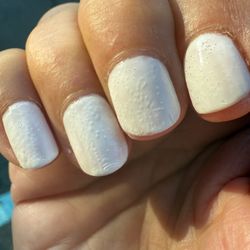 Golden Touch Nails - bubbly nail polish  why??? awful. never dried under the top coat either.