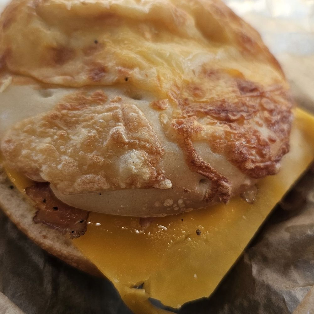 Einstein Bros. Bagels - 6 cheese bagel with cheddar cheese, egg, bacon (toasted) - Bagels Near Me - Las Vegas, Nevada Einstein Bros. Bagels - 6 cheese bagel with cheddar cheese, egg, bacon (toasted) - Bagels Near Me - Las Vegas, Nevada