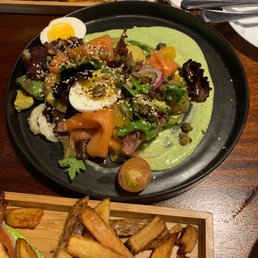 We had the smoked salmon, avocado with fried capers on a bed of mixed greens salad and green goddess dressing. Delicious