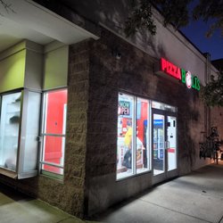 Pizza Boli's - Corner store. Big tree kinda blocks it.