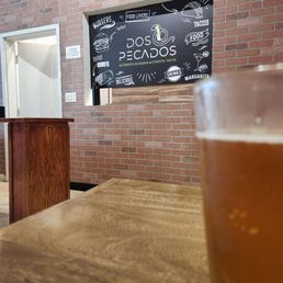 a glass of beer on a table