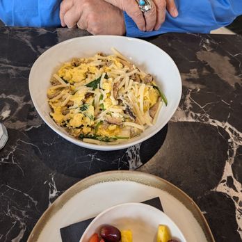 Graze - Egg bowl with grits turkey sausage mushrooms spinach and cheddar cheese.. very filling!! - Waffles Near Me - Tampa, Florida