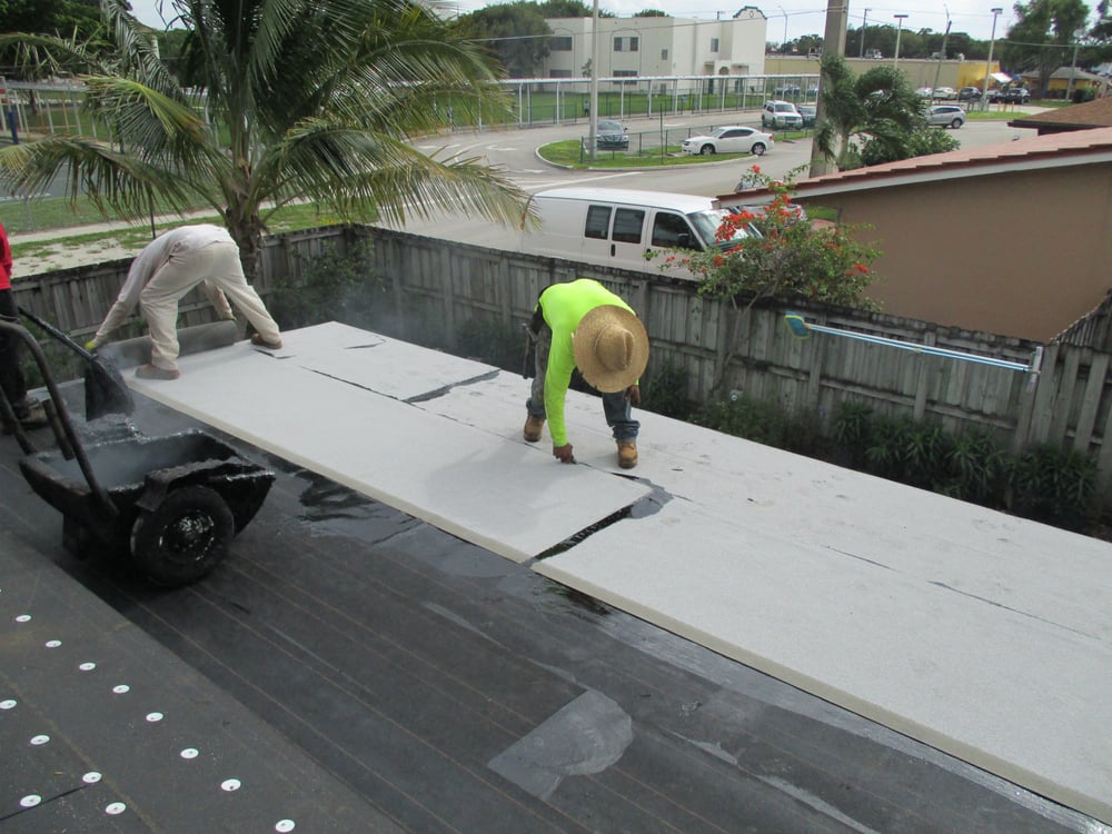 Slide of Heron Bay Roofing