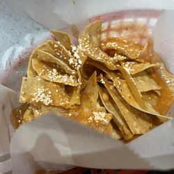 El Katracho Restaurant - Complementary Table Appetizer. -Tortilla chips drizzled house sauce , cotija cheese topper