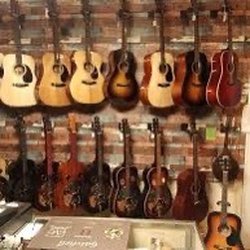 Folk Music Store - Guitars, Banjos, Mandolins, Fiddles, Upright Bass, and all your bluegrass/ gospel instrument need's.
