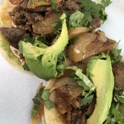 Lucys Tacos - Walla walla tacos with fresh sautéed onions, spices and avocado!