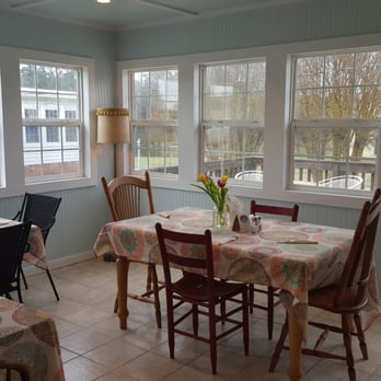 The Kitchen Table - Back Porch seating is the best. - Cafes Near Me - Gasburg, Virginia
