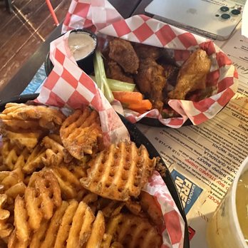 Bethany Boathouse - waffle fries and old bay wings - Bars Near Me - Bethany Beach, Delaware