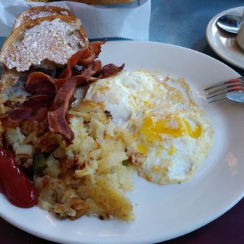 Broadway Diner - Eggs over medium, crispy bacon, home fries and rye toast.  Perfection!!! - Diners Near Me - Baltimore, Maryland