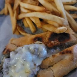 Cheesesteak (this is 1/2) with fries