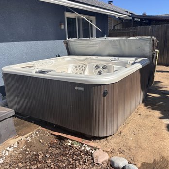Alpha One Demolition & Hauling - They had to wrestle with this spa to get it down the side of the house. - Junk Removal & Hauling Near Me