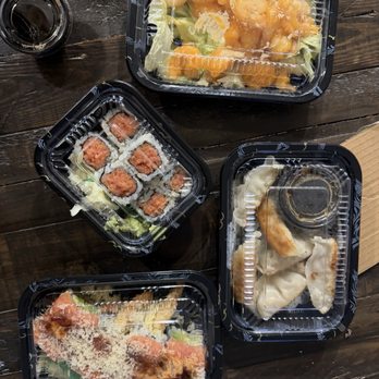 Osushi - Ardmore - $60 worth of takeout. From top to bottom: rock shrimp aioli, spicy tuna roll, pork dumplings, OMG roll. - Sushi Bars Near Me - Ardmore, Pennsylvania
