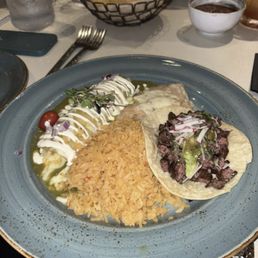 Chicken Enchilada & Taco plate with beans and rice.