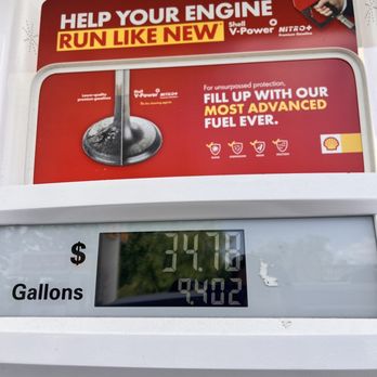 Shell - a gas pump with a clock on it - Gas Stations Near Me - Decatur, Georgia