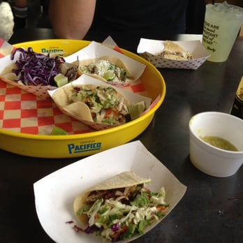 Rusty Taco - BBQ pork taco up front, fired chicken, brisket and shrimp in the back. - Tex-Mex Near Me - Minneapolis, Minnesota Rusty Taco - BBQ pork taco up front, fired chicken, brisket and shrimp in the back. - Tex-Mex Near Me - Minneapolis, Minnesota