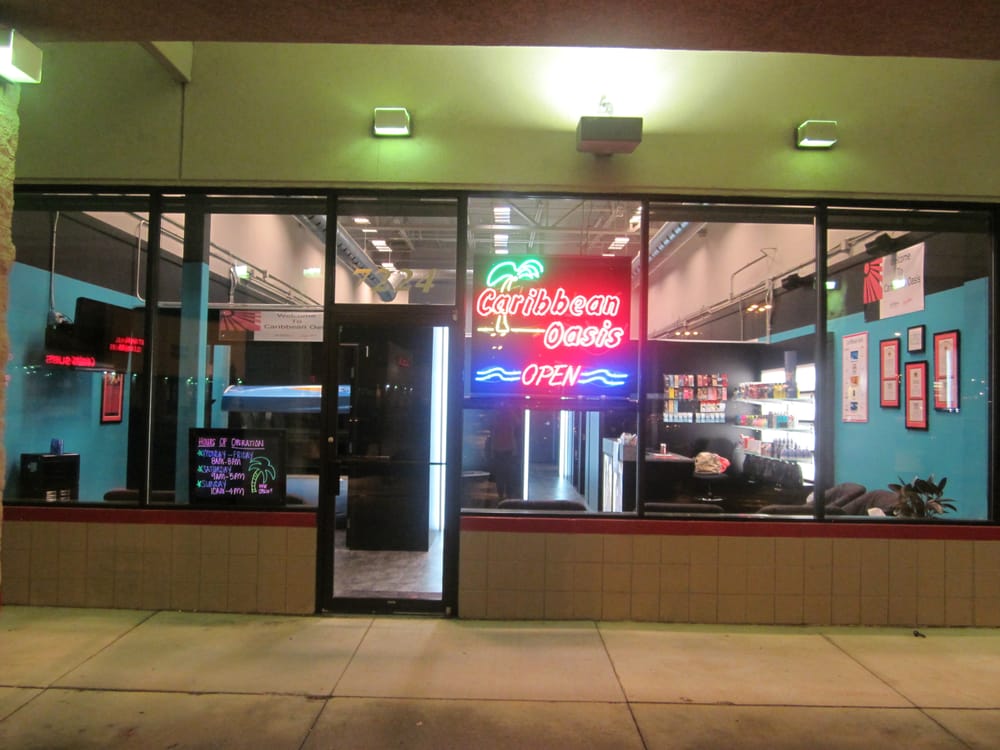 Caribbean Oasis Tanning Salon Logo