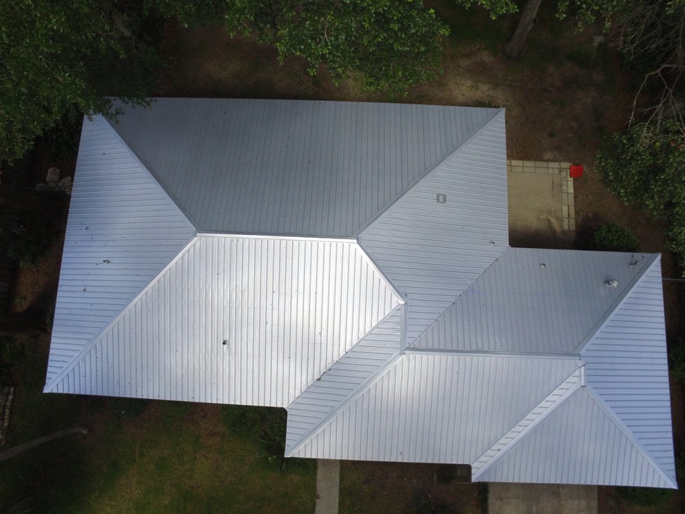 Slide of TMT Roofing