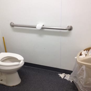 CVS Pharmacy - The ladies room. Not sure where the toliet paper holder even was but the roll there was empty! - Drugstores Near Me - Naples, Florida