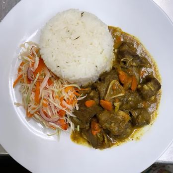 Leng Earth Food - curry goat white rice, salad - Caribbean Near Me - Queens, New York Leng Earth Food - curry goat white rice, salad - Caribbean Near Me - Queens, New York