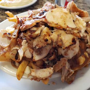 Shawarma Palace - Poutine with chicken swarma medium size - Middle Eastern Near Me - Ottawa, Ontario Shawarma Palace - Poutine with chicken swarma medium size - Middle Eastern Near Me - Ottawa, Ontario