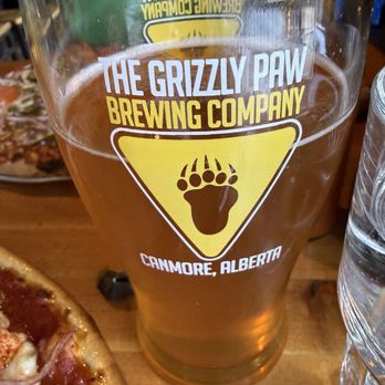 Rocky Mountain Flatbread Co - Grumpy Bear Honey Wheat beer - Pizza Near Me - Canmore, Alberta Rocky Mountain Flatbread Co - Grumpy Bear Honey Wheat beer - Pizza Near Me - Canmore, Alberta