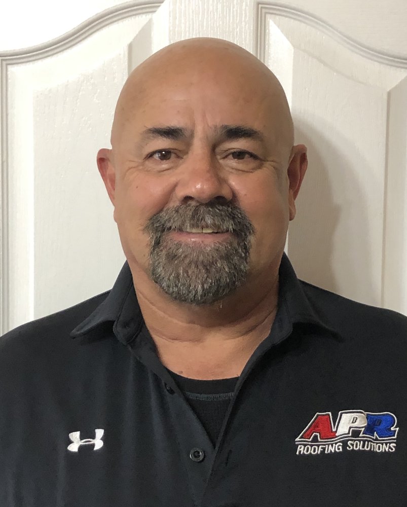 Slide of APR Roofing Solutions