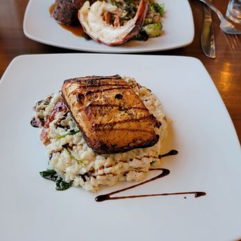Canoe Restaurant and Tavern - Pan seared salmon with risotto, and the surf and turf special. - New American Near Me - Center Harbor, New Hampshire Canoe Restaurant and Tavern - Pan seared salmon with risotto, and the surf and turf special. - New American Near Me - Center Harbor, New Hampshire