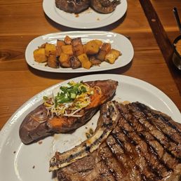 Bottom entre was the Cowboy steak with loaded sweet potatoes Side was butter squash Top wqs Pete's Steak Bottom entre was the Cowboy steak with loaded sweet potatoes Side was butter squash Top wqs Pete's Steak