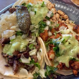 Asada, pollo and carnitas street tacos Asada, pollo and carnitas street tacos