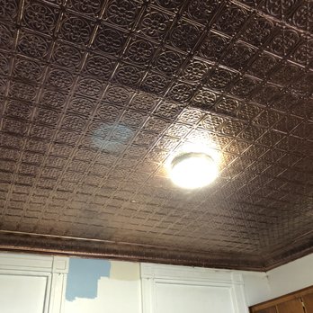 AT Paint and Plaster - Tin ceiling spray-painted with Rustoleum Bright Copper - Painters Near Me