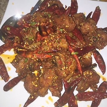 Crystal Asian Cuisine - Chicken with fresh and covered with VERY spicy peppers. - Dim Sum Near Me - Buffalo, New York Crystal Asian Cuisine - Chicken with fresh and covered with VERY spicy peppers. - Dim Sum Near Me - Buffalo, New York
