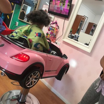 Family Cutz - She is so calm first hair cut , she listening enjoying the movie will come back here for sure - Kids Hair Salons Near Me - Paramount, California