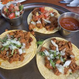 Trio of carne asada tacos off the happy hour menu. So good! Trio of carne asada tacos off the happy hour menu. So good!