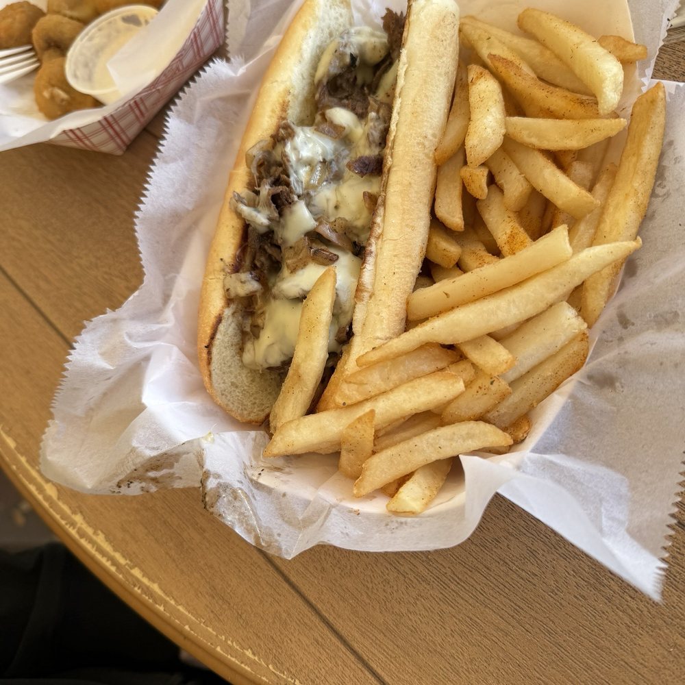 Big Dog Station - Philly Cheesesteak - Sports Bars Near Me - Oakland Park, Florida Big Dog Station - Philly Cheesesteak - Sports Bars Near Me - Oakland Park, Florida