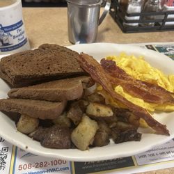 Breakfast Nook - Big breakfast eggs, any style two bacon, two sausage toast, home fries choice of pancakes with French toast
