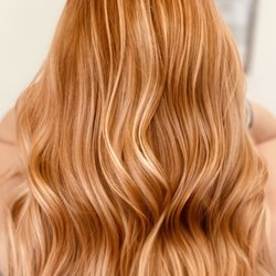 Keota's Hair Design - Transition from a grow out bleached blonde look into a light golden copper blonde balayage dimensional.
