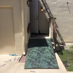 Sunrise Management - "Before" Sunrise Management Company removed my Tarp that was covering damage done to my handicap ramp during the reroofing of our condo