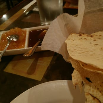 Cinnamon Indian Restaurant - Crispy chip bread thing with apricot sauce, spicy green sauce, and tangy sweet sauce. - Indian Near Me - Morris Plains, New Jersey Cinnamon Indian Restaurant - Crispy chip bread thing with apricot sauce, spicy green sauce, and tangy sweet sauce. - Indian Near Me - Morris Plains, New Jersey