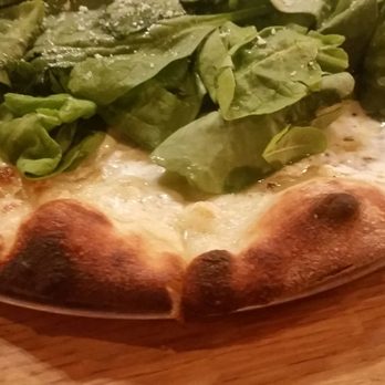 Zander's Woodfired Pizza - The White Bluff- a white pizza with creamy ricotta cheese & olive oil finished with fresh arugula & baby spinach - American Near Me - Dickson, Tennessee Zander's Woodfired Pizza - The White Bluff- a white pizza with creamy ricotta cheese & olive oil finished with fresh arugula & baby spinach - American Near Me - Dickson, Tennessee