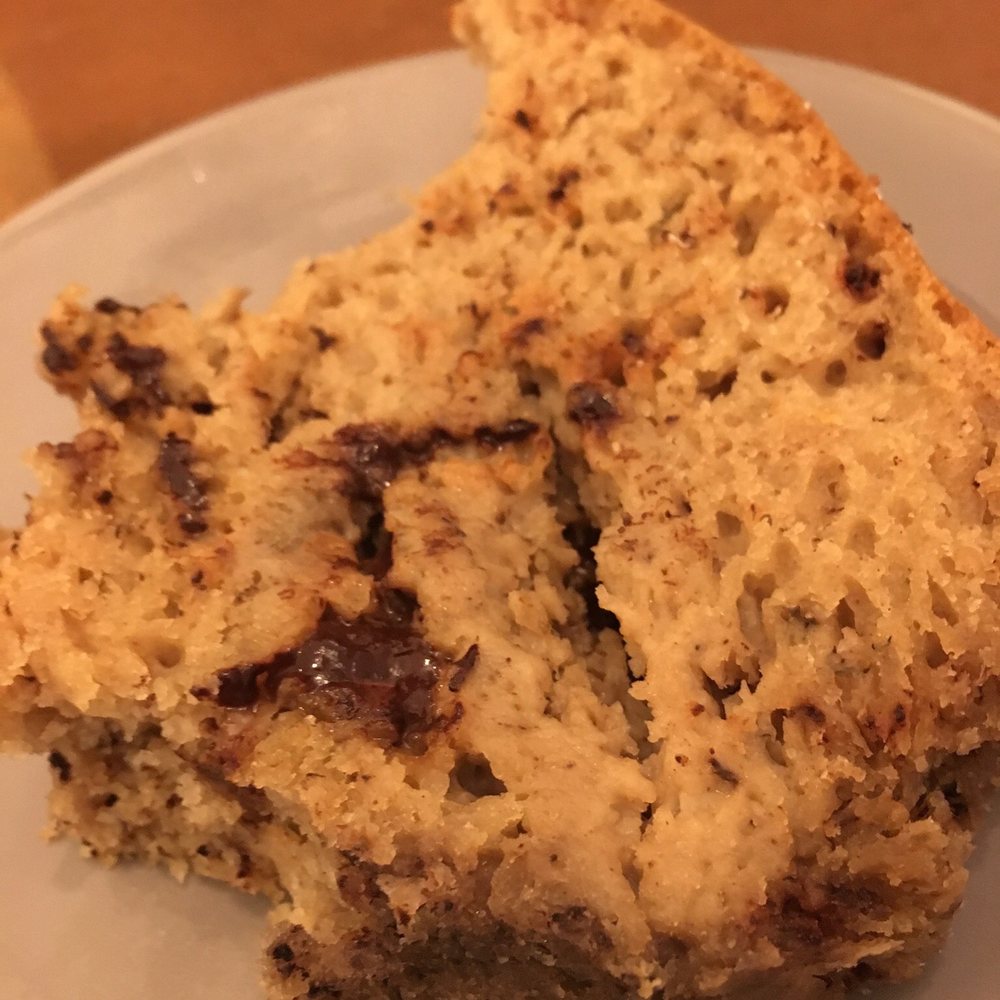 Chilling Café - Half eaten chocolate banana bread. - Vegan Near Me - Madrid, M