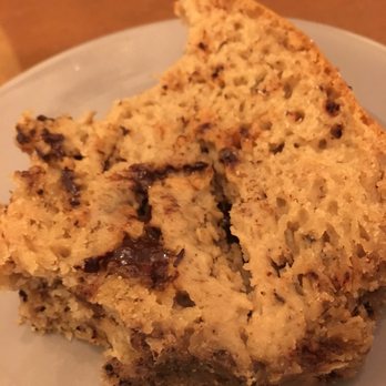 Chilling Café - Half eaten chocolate banana bread. - Vegan Near Me - Madrid, M